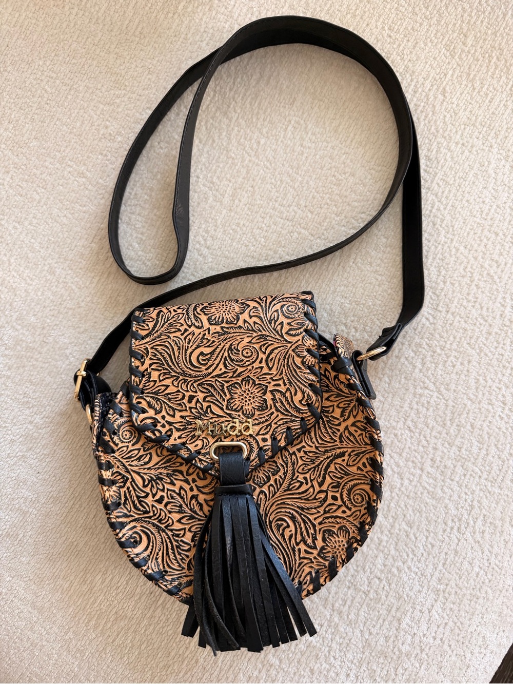 Black and Tan Floral Embossed Crossbody Bag with Tassel